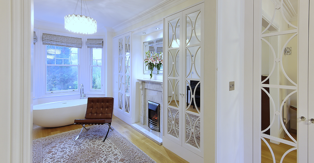 traditional white hand painted fret work bedroom